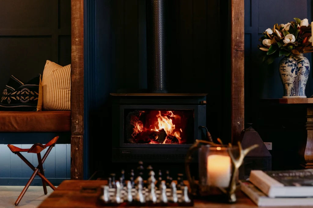 VH Country Club lounge with fireplace at Verandah House Country Estate