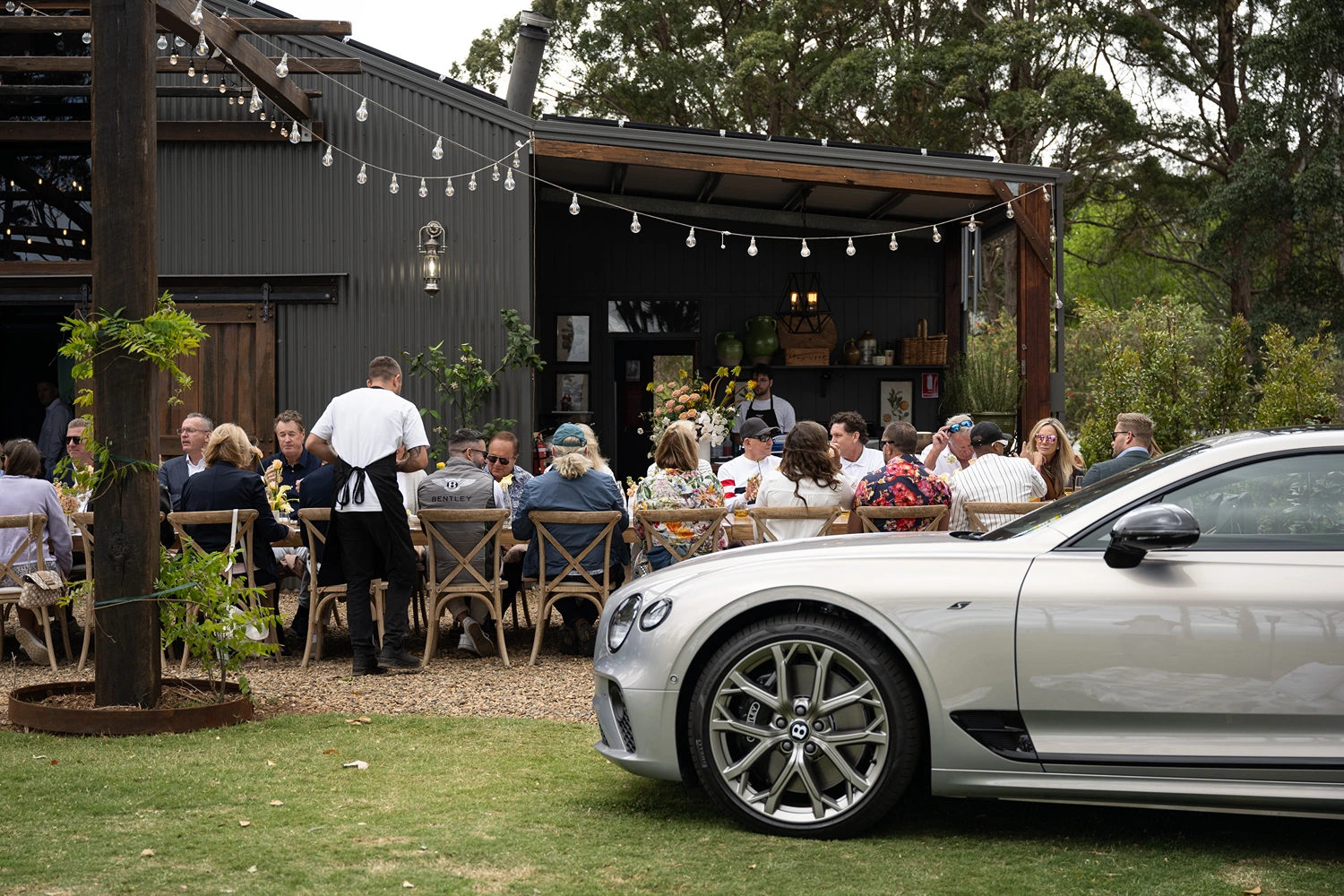 Corporate retreat guests dining outdoors at VH Country Estate on Tamborine Mountain